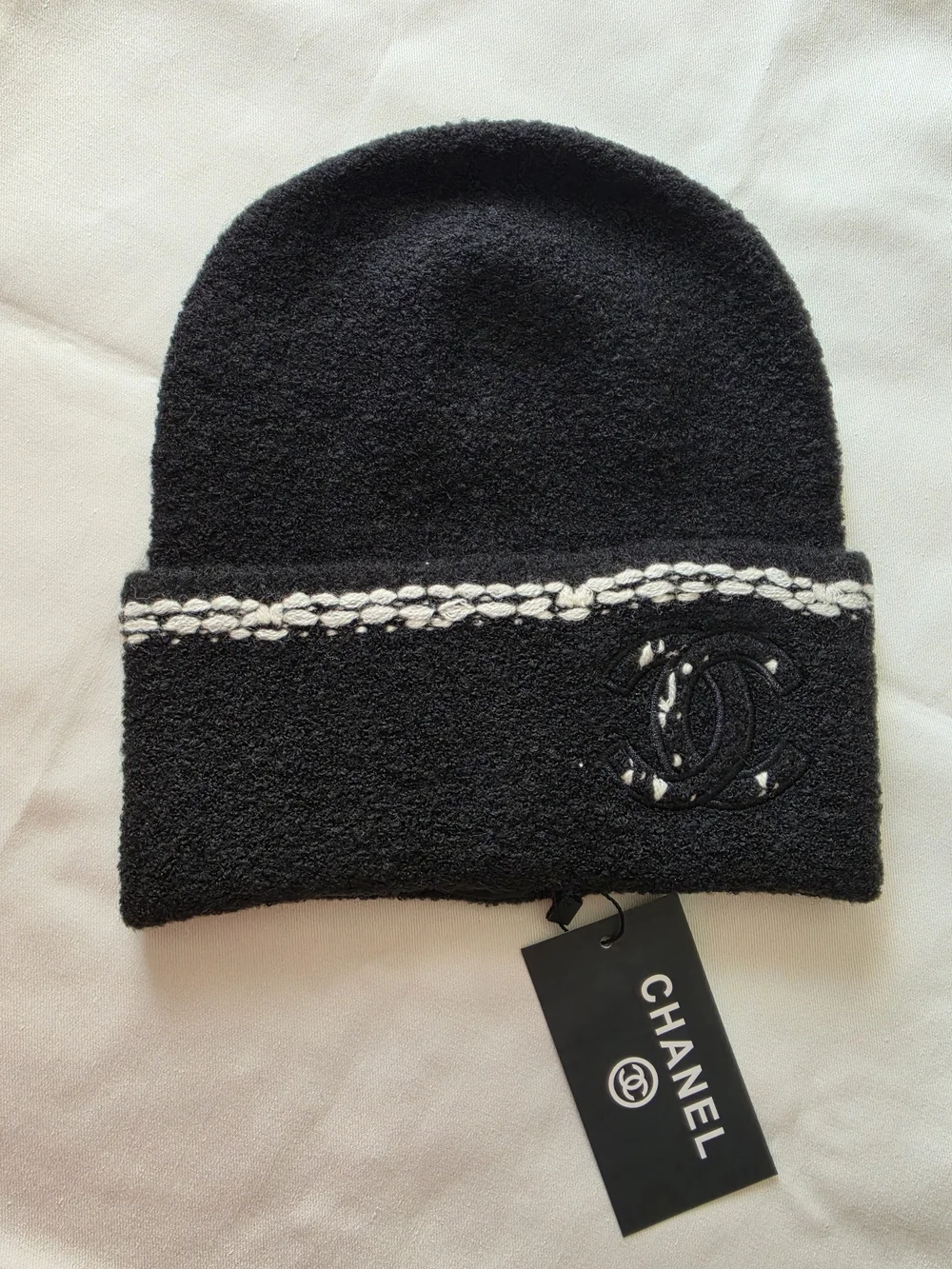 Black Knit Beanie with Cream Braided Trim and Patch